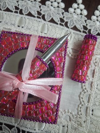 Block notes con specchio e penna
