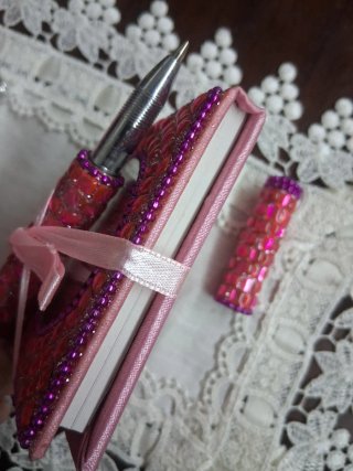 Block notes con specchio e penna