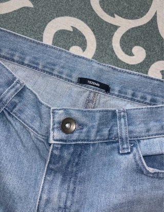 Shorts di jeans strappati donna