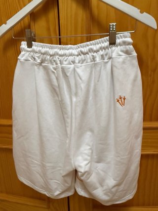 Camiseta Nike NOCTA Naranja y Blanca