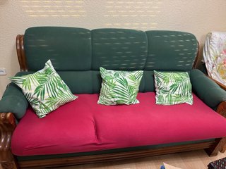 Sofá CAMA de tela verde y rojo
