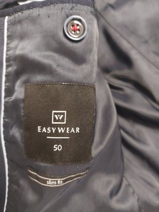Traje de vestir azul Easy Wear Slim Fit usado.