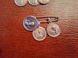 Medallas religiosas de plata