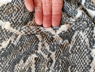 Pantalón de punto con estampado animal print