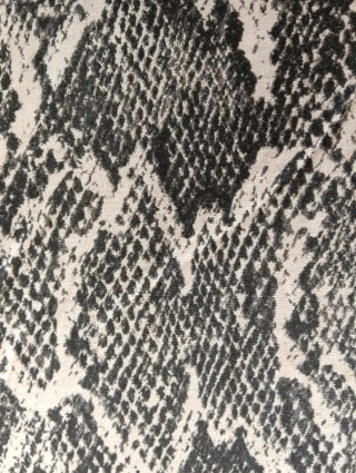 Pantalón de punto con estampado animal print