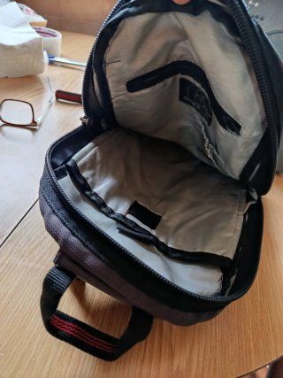 Zaino Diesel grigio con dettagli verdi