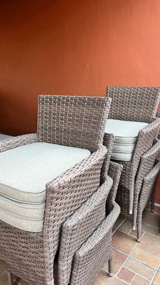 Mesa de jardín de cristal y ratan + 6 sillones