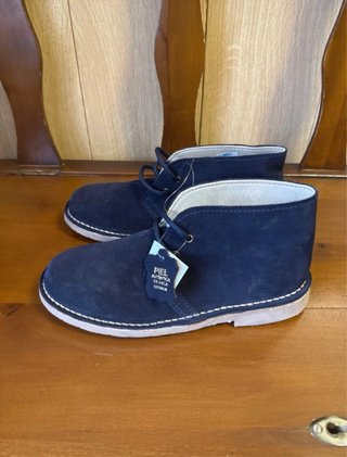 Botines azul marino con cordones de piel