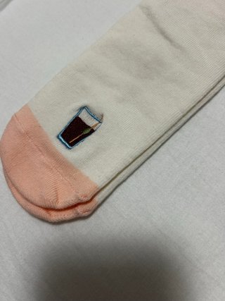 Calcetines beige/rosa talla única.
