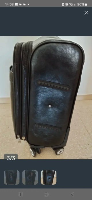 Maleta de viaje negra con ruedas