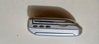 Teléfono móvil Motorola V50 plateado vintage