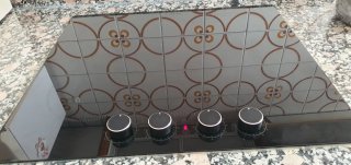 Placa de inducción 4 fuegos con mandos