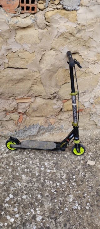 Patín plegable con ruedas verdes