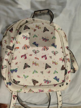 Mochila juvenil con estampado de mariposas
