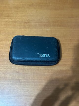 Nintendo DSi XL + pennino + caricatore