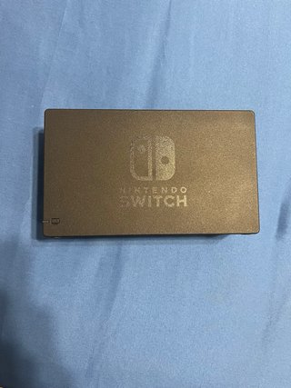 Nintendo Switch Dock y Agarre las 2 cosas 50€
