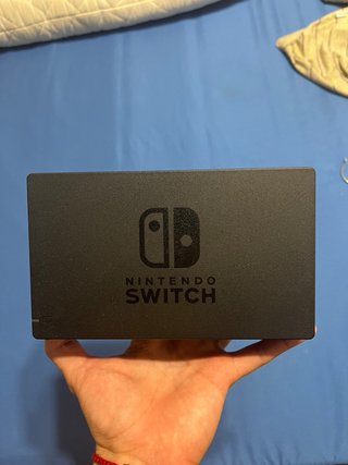 Nintendo Switch Dock y Agarre las 2 cosas 50€