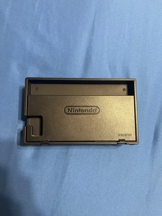 Nintendo Switch Dock y Agarre las 2 cosas 50€