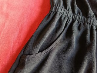 Mono elástico negro.
