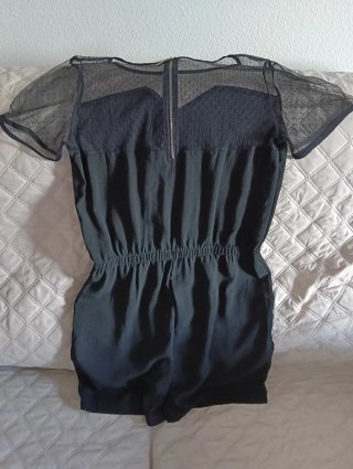Mono elástico negro.
