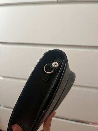 Bolso negro de mano o para colgar