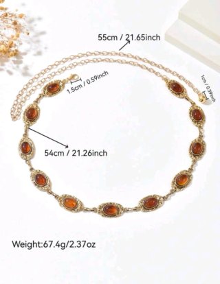 Elegante cadena de cintura dorada con piedras