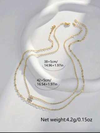Elegante collar dorado doble con colgante