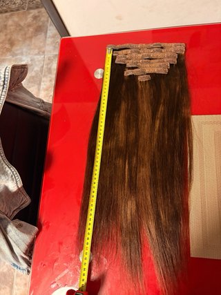Extensiones de cabello castaño