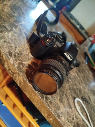 Urgente vendita Fotocamera Nikon D3100 usata due volte