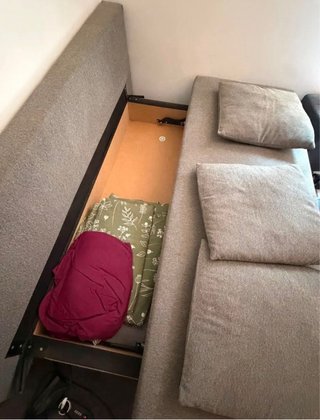 Divano letto con contenitore grigio