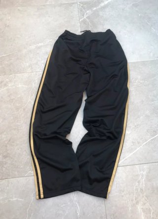 Pantalón Adidas Firebird Negro y Dorado