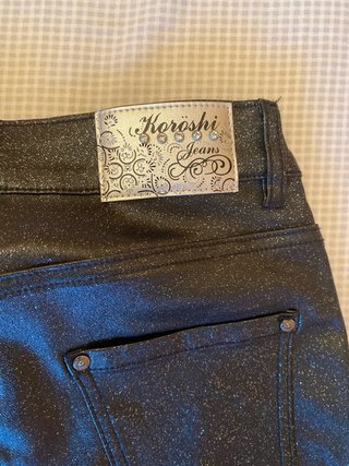 Pantalones tipo cuero polipiel con brillantina