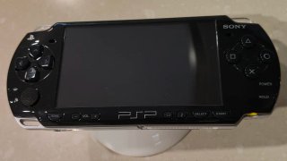 Sony PSP-2004 Slim & Lite Negra + 3 juegos