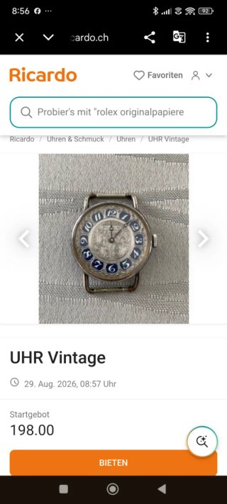 Reloj Vintages, de pulsera plateado con esfera azu
