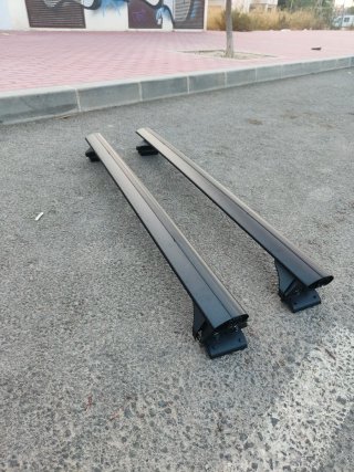 Barras de techo Cruz + fijaciones baca