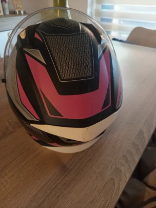 Casco de moto integral rosa y negro