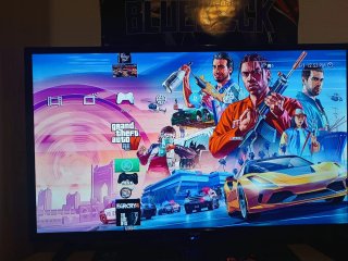 PS3 (PlayStation 3) Negra + 2 Juegos