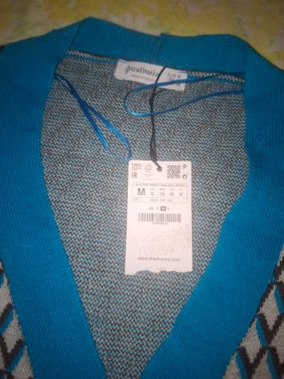 Chaquetas Stradivarius punto rombos.