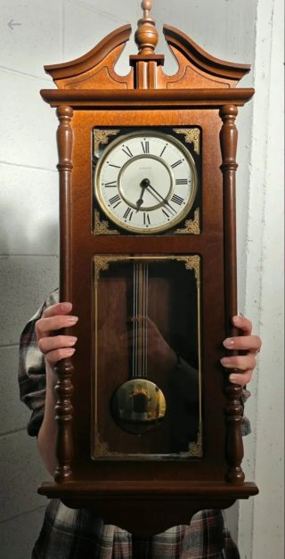Orologio a pendolo in legno