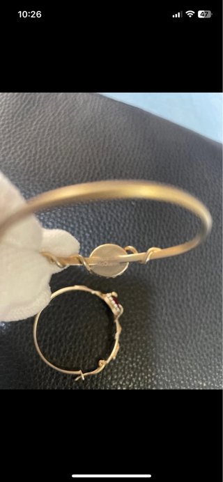 Pendientes aro Alexander McQueen oro y rubí
