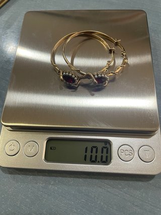 Pendientes aro Alexander McQueen oro y rubí