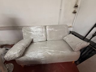 Sillón cama gris de tela