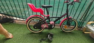 Bicicleta infantil Btwin rosa y negra