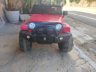 Coche eléctrico infantil todoterreno jeep