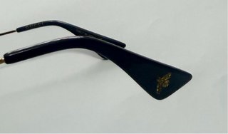 Gafas de sol Gucci doradas y negras