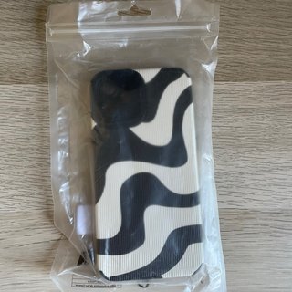 Cover texturizzata bianco e nero per iPhone 12