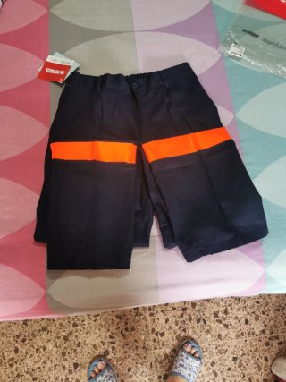 Pantalón de trabajo azul con franja Naranja.T. 42