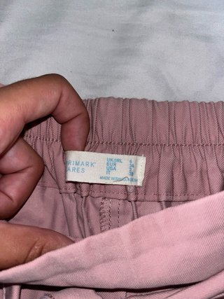 Pantalón corto rosa de pinza con cinturón