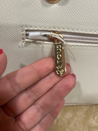 Mala e porta-moedas Tous bege e rosa