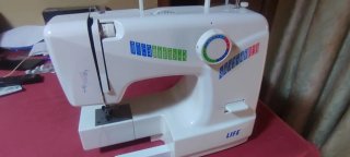 Máquina de coser eléctrica LIVE